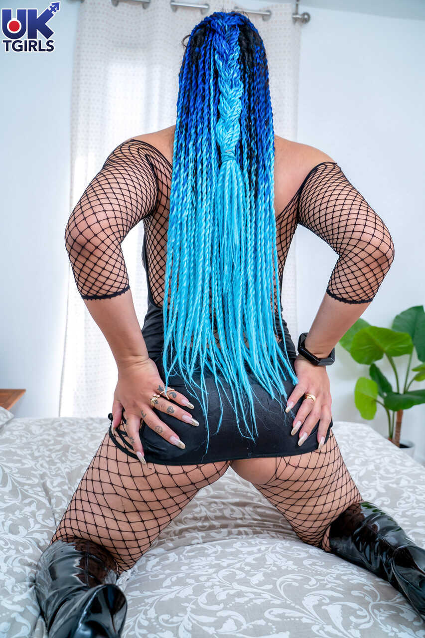 Blue-Haired Estelle Mounty Posing With Her Fishnets and Toys, Playfully Exposing Her Curvaceous Ass for the Camera