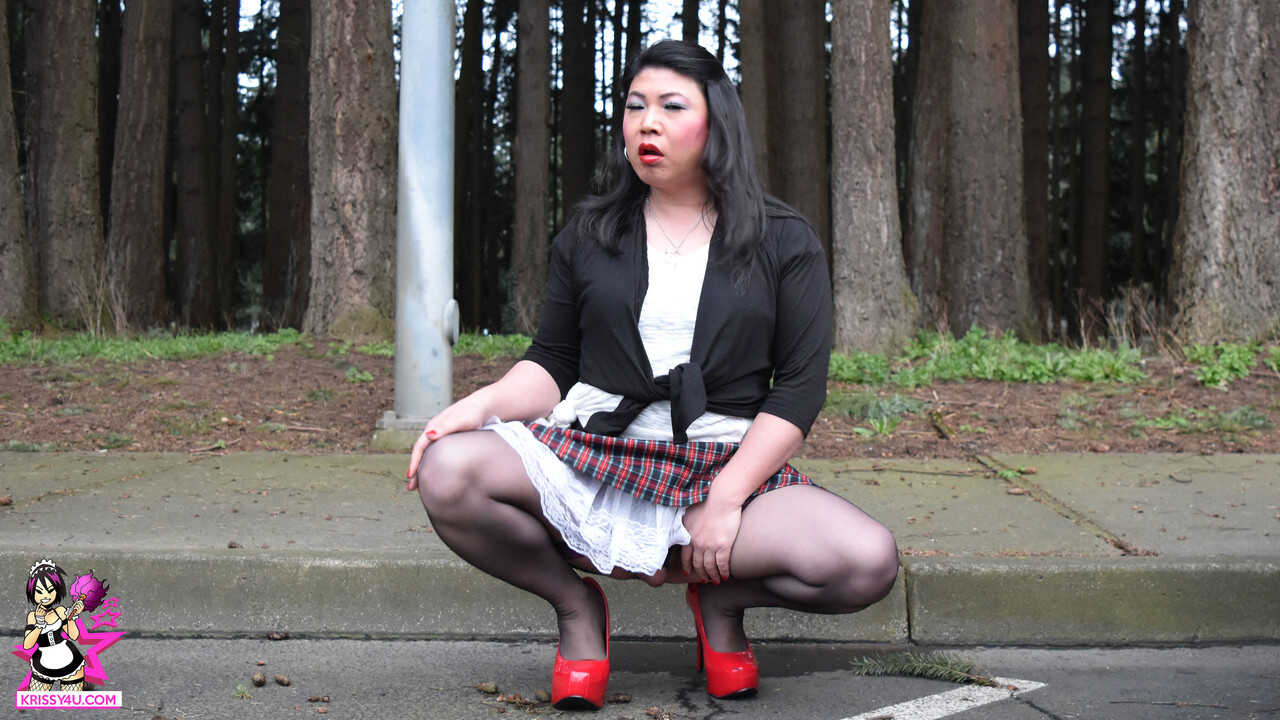Exotic Asian Shemale in Sexy Stockings and High Heels Teases Her Long Legs - 