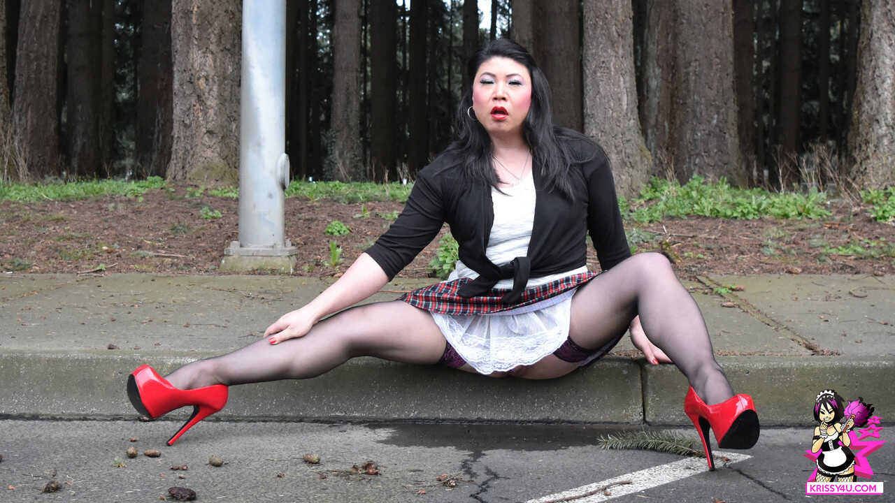 Exotic Asian Shemale in Sexy Stockings and High Heels Teases Her Long Legs - 