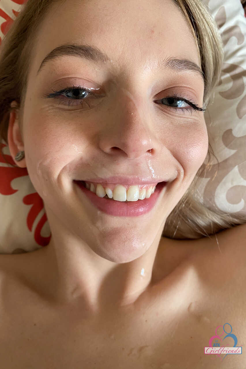 Cute amateur girlfriend Lily Larimar displays her shaved cunt on a bed - Lily Larimar