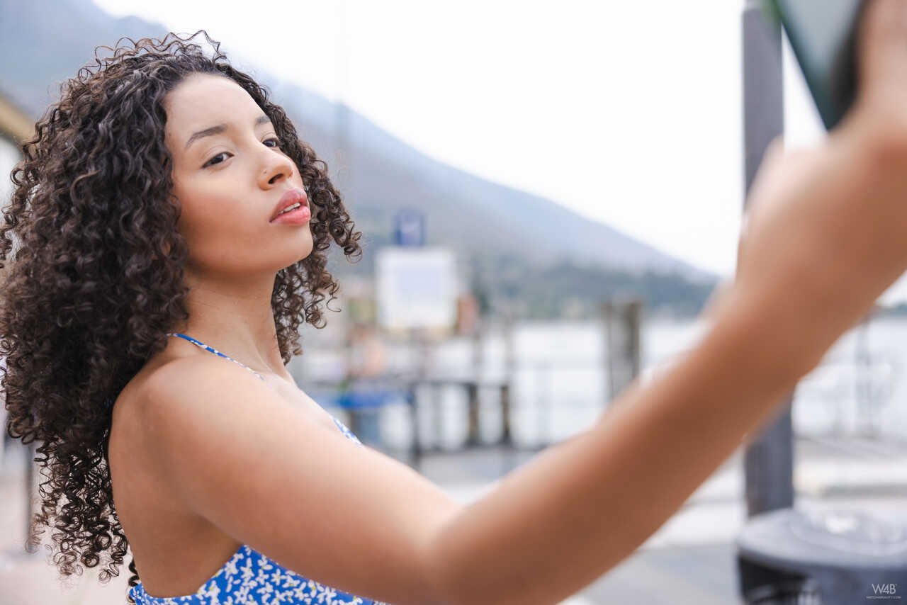 Valery Ponce shows off her curly hair and bouncy booty in the great outdoors 