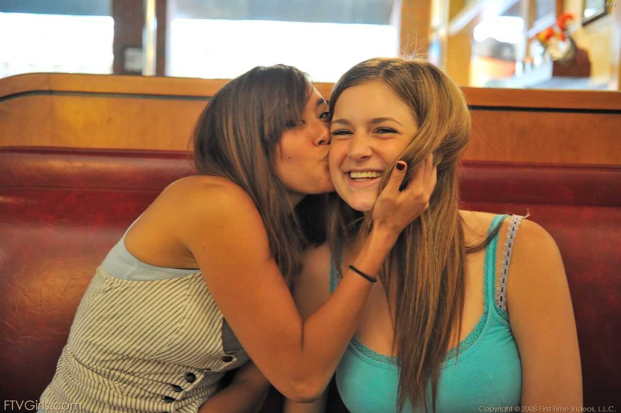 Naughty Miyu and Danielle share a passionate kiss while doing acrobatic exercises butt naked in public. - Danielle Delauna...