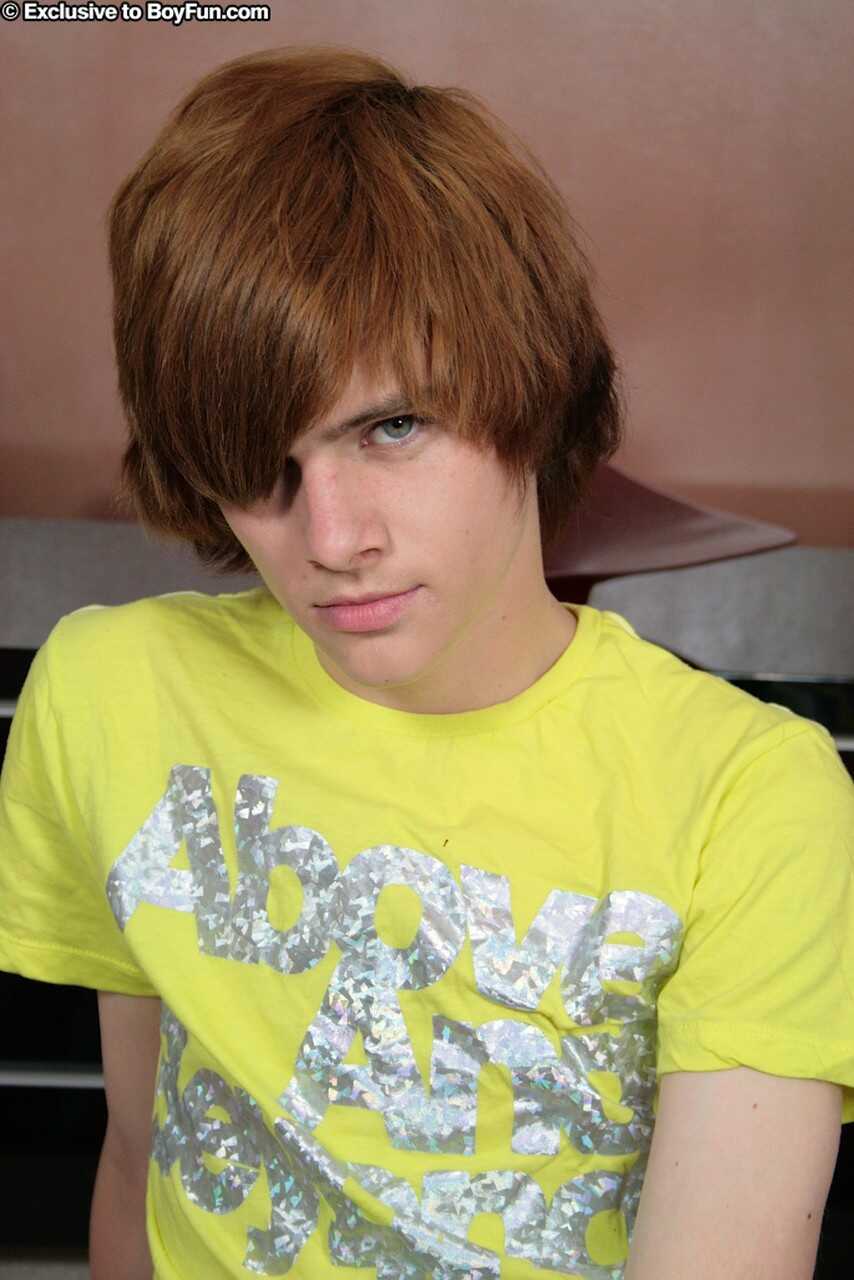 Young gay Frankie Lockheart strokes his small dick until he ejaculates into his hairy ball sack while wearing tight pink p...