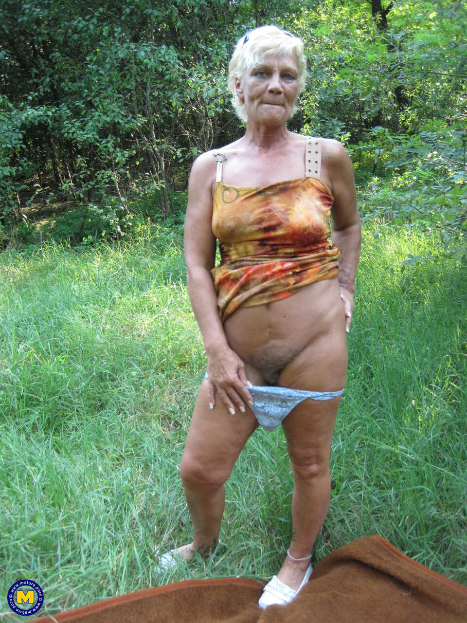 Granny Paulene Shows Off Her Pussy and Boobs in the Grass, Hairy and Skinny! - Paulene