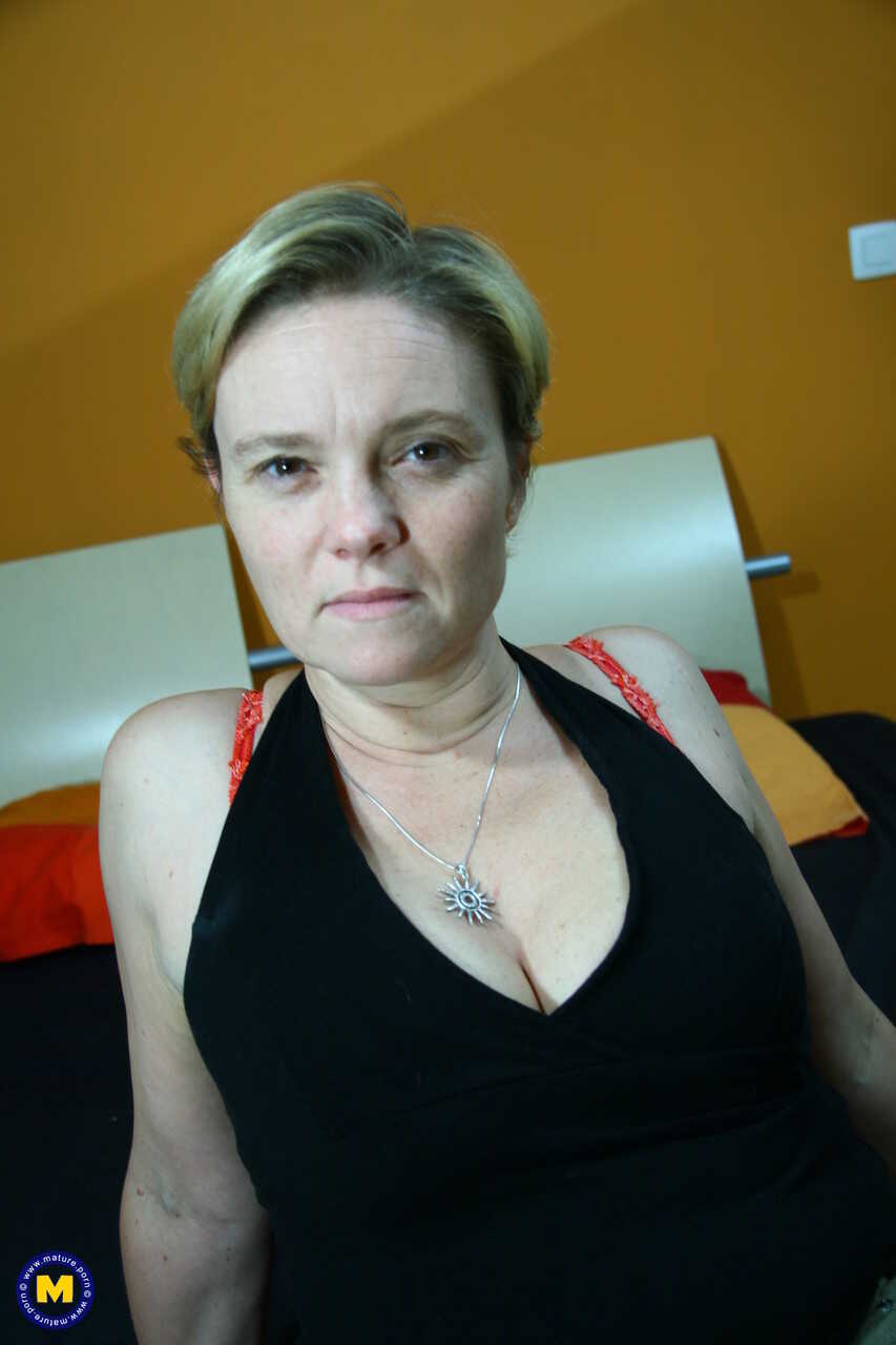 Blonde Short-haired MILF Eva H Gets Naughty With Her Tits and Pussy in a Solo Scene - Eva H