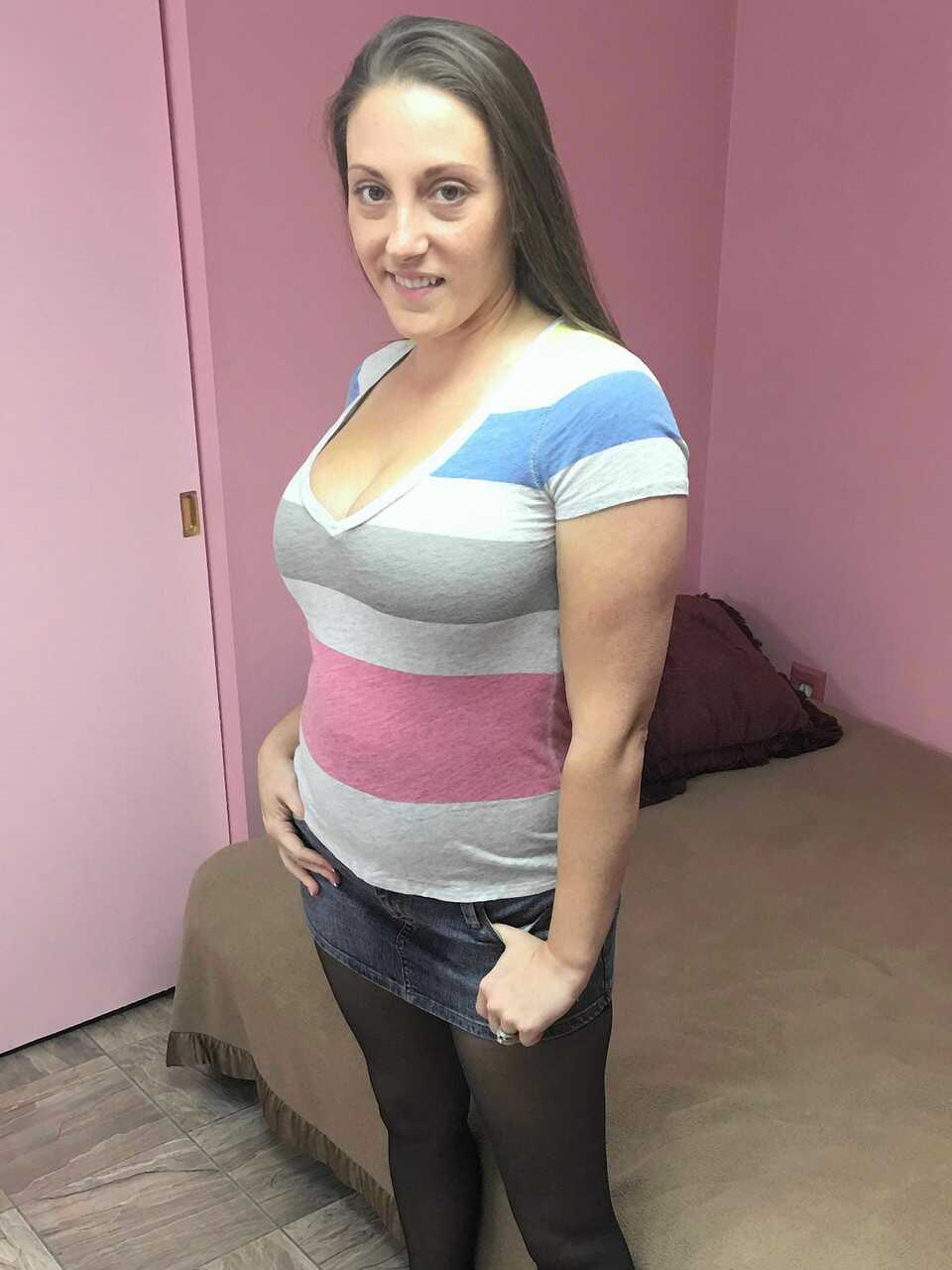 Busty Melanie Hicks shows off her juicy tits & dildos herself in a tight dress while being watched by an eager strange...