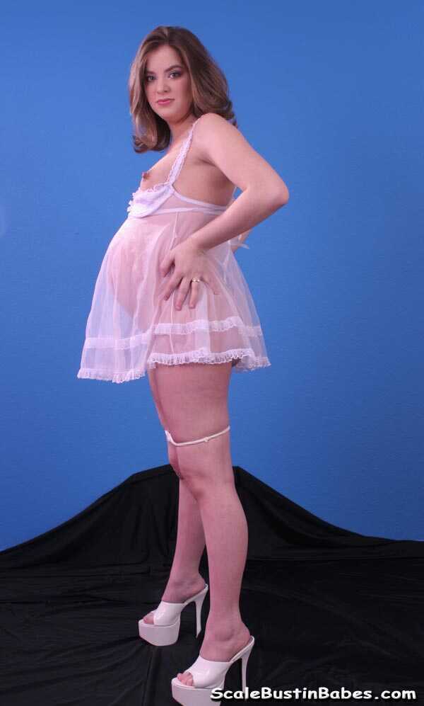 Dandi's Swollen Twat: Pregnant Teen Strips Her Sheer Negligee and Rubs Her Belly - Dandi