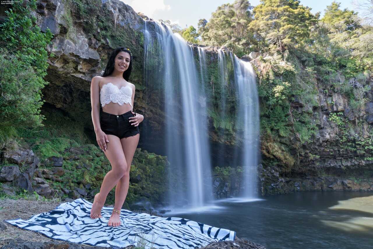 Hot Brazilian teen Gina Valentina strips down and spreads her muff by the waterfalls while showing off her latina ass and ...