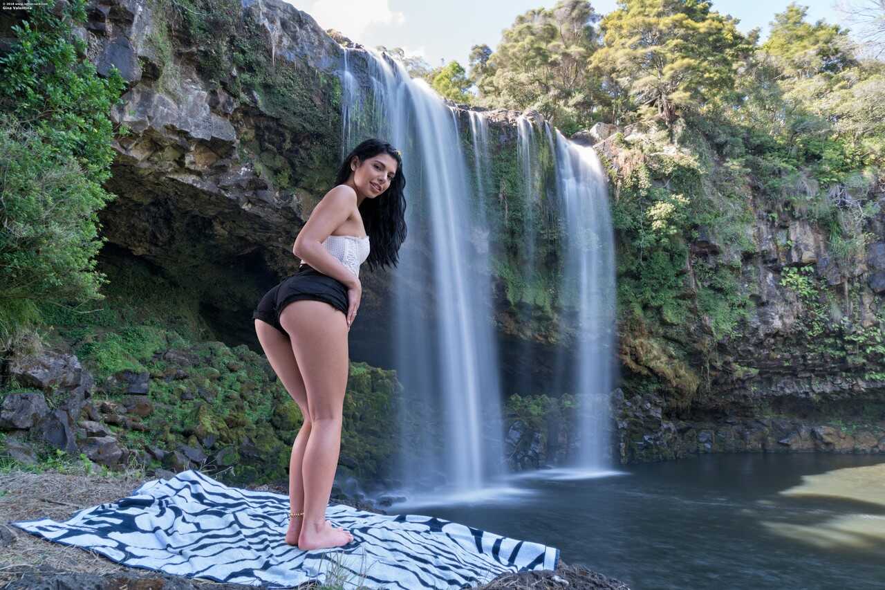 Hot Brazilian teen Gina Valentina strips down and spreads her muff by the waterfalls while showing off her latina ass and ...