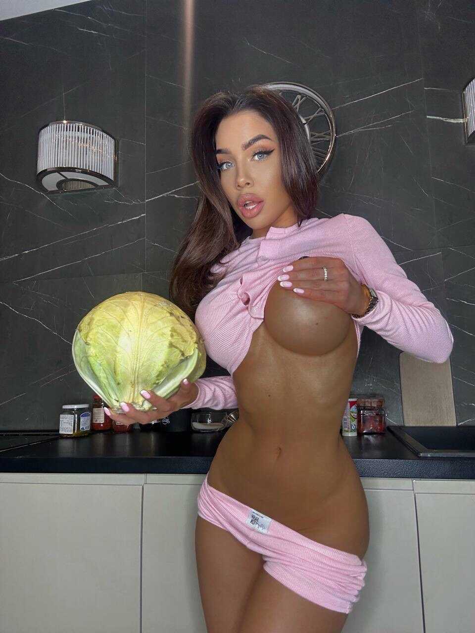 Nastya Star's Kitchen Cutie Striptease: A Pink Provocation for OnlyFans Subscribers - 