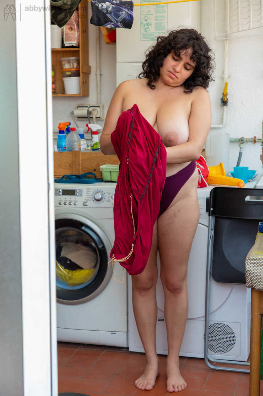 Chubby Emily V gets spied on while dressing in the laundry room - Emily V