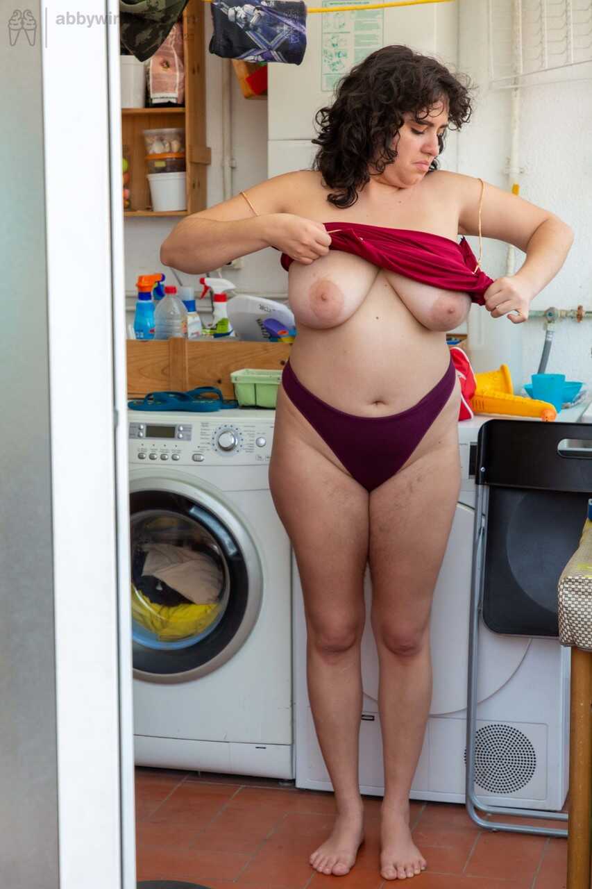 Chubby Emily V gets spied on while dressing in the laundry room - Emily V