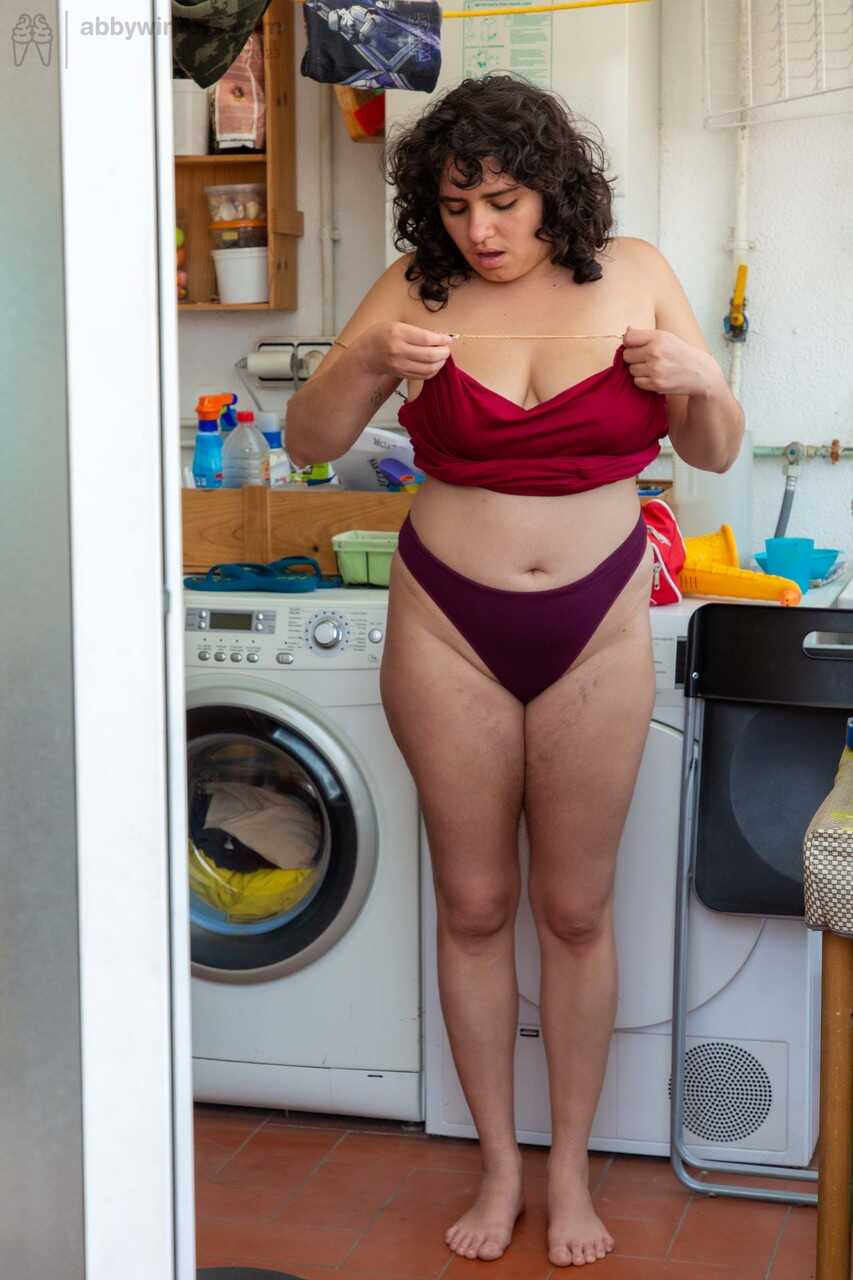 Chubby Emily V gets spied on while dressing in the laundry room - Emily V