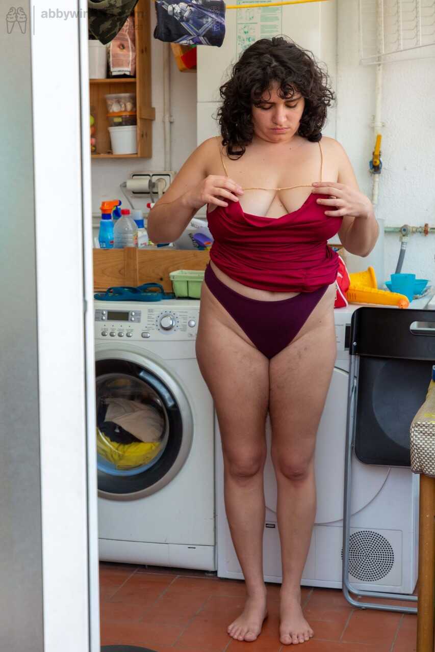 Chubby Emily V gets spied on while dressing in the laundry room - Emily V
