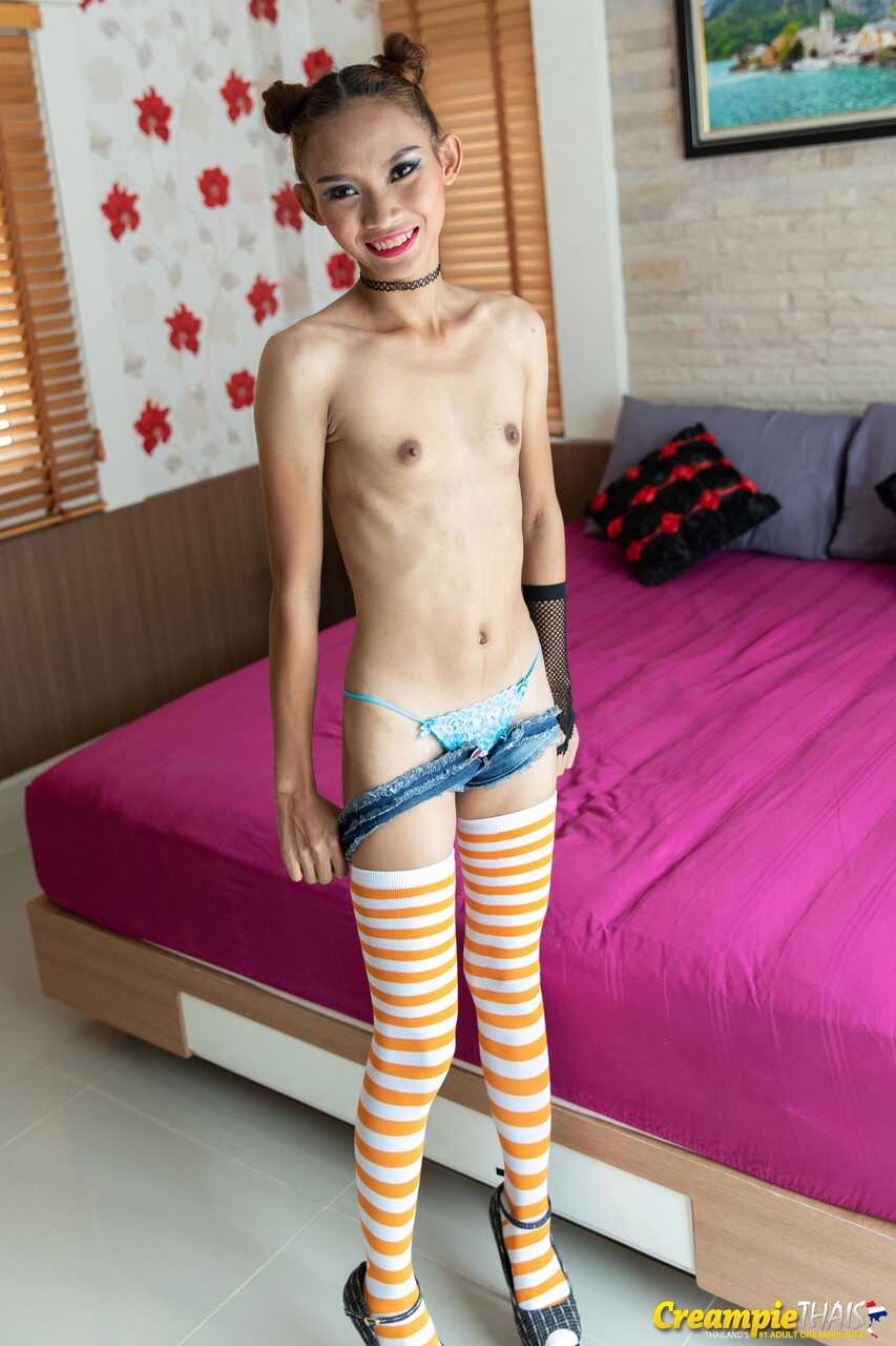 Naughty Little Naphasorn Strips Down to Her Stocking & Heels and Shows Off Her Tight Asian Ass and Muff - Naphasorn