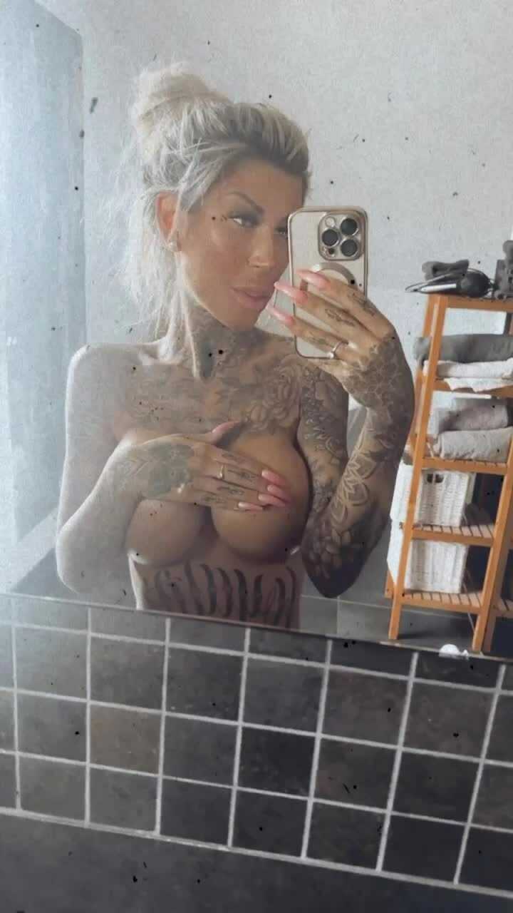 Blonde Ink Bombshell's Busty Titties Revealed In Skimpy Bikini