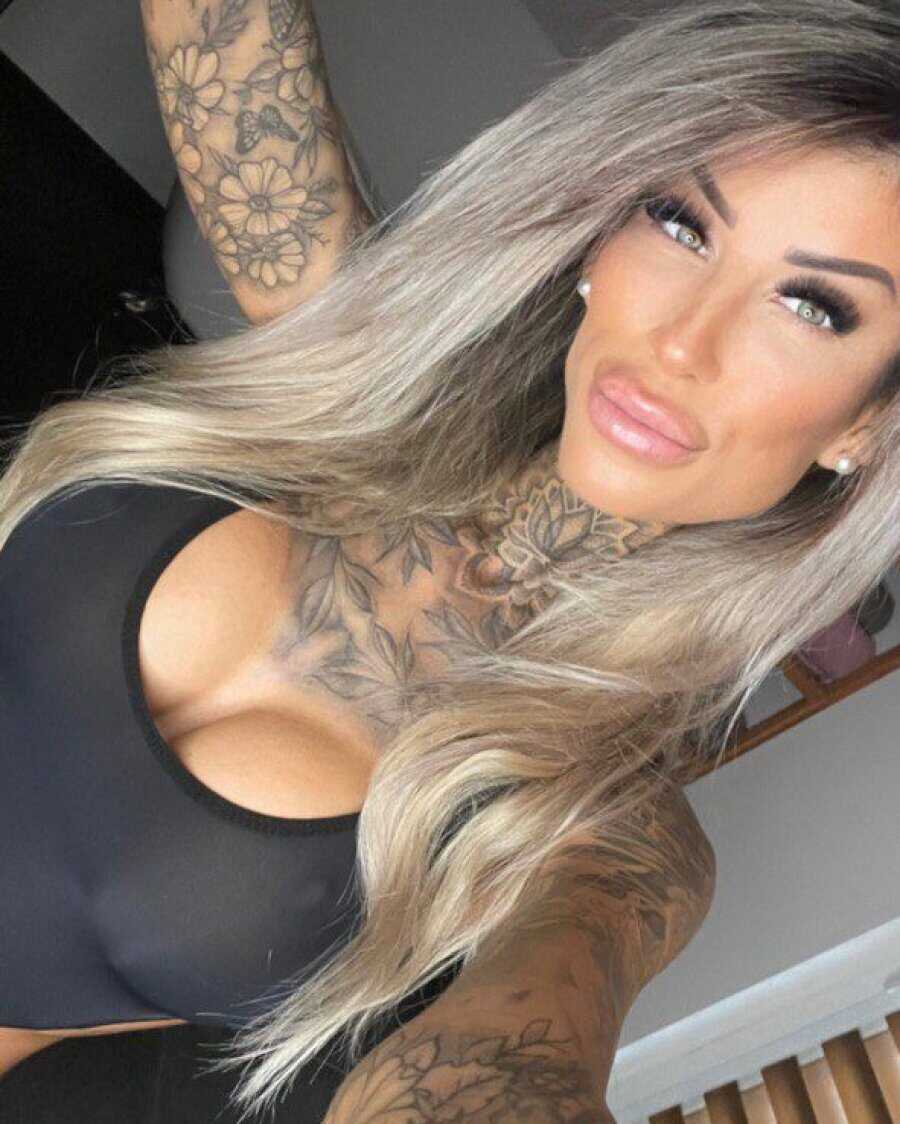 Black Lingerie Nympho with Sexy Tats Shows Off Her Big Titties