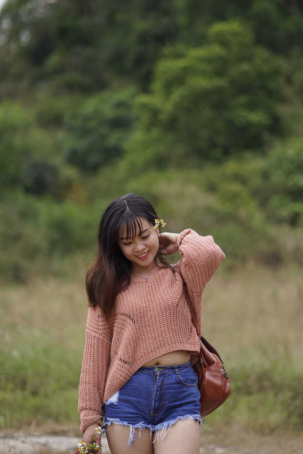 Exotic Asian beauty struts in teeny denim shorts and comfy sweater, steaming up the streets! - 