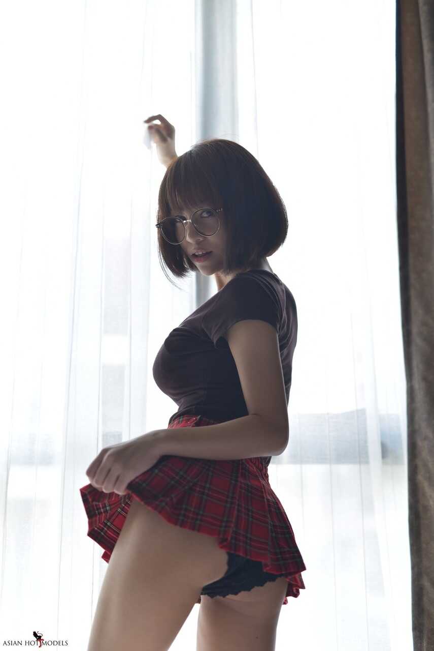 Exposing her sweet Asian booty in a miniskirt and panties, Eimi Fukada teases in her upskirt no panties scene.