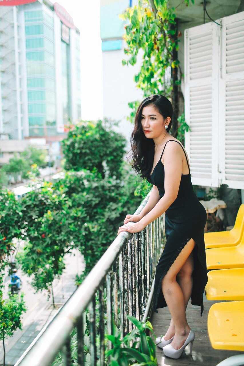 Sultry Asian Bombshell Poses Seductively in Her Slinky LBD and Killer Heels