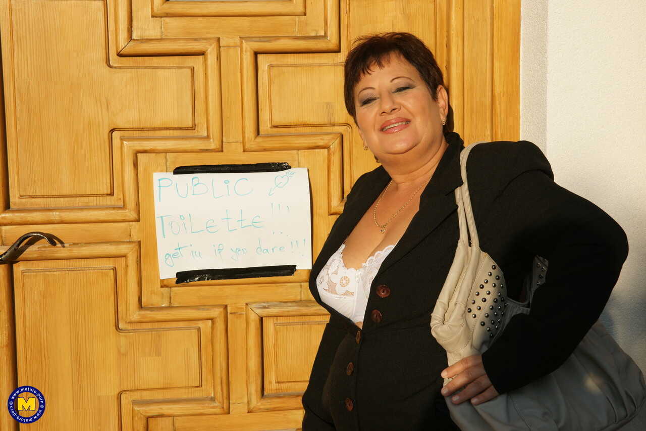 Busty BBW Mariette gets her hairy pussy fucked in a public toilet by a mature dog with a hairy ass! - Mariette