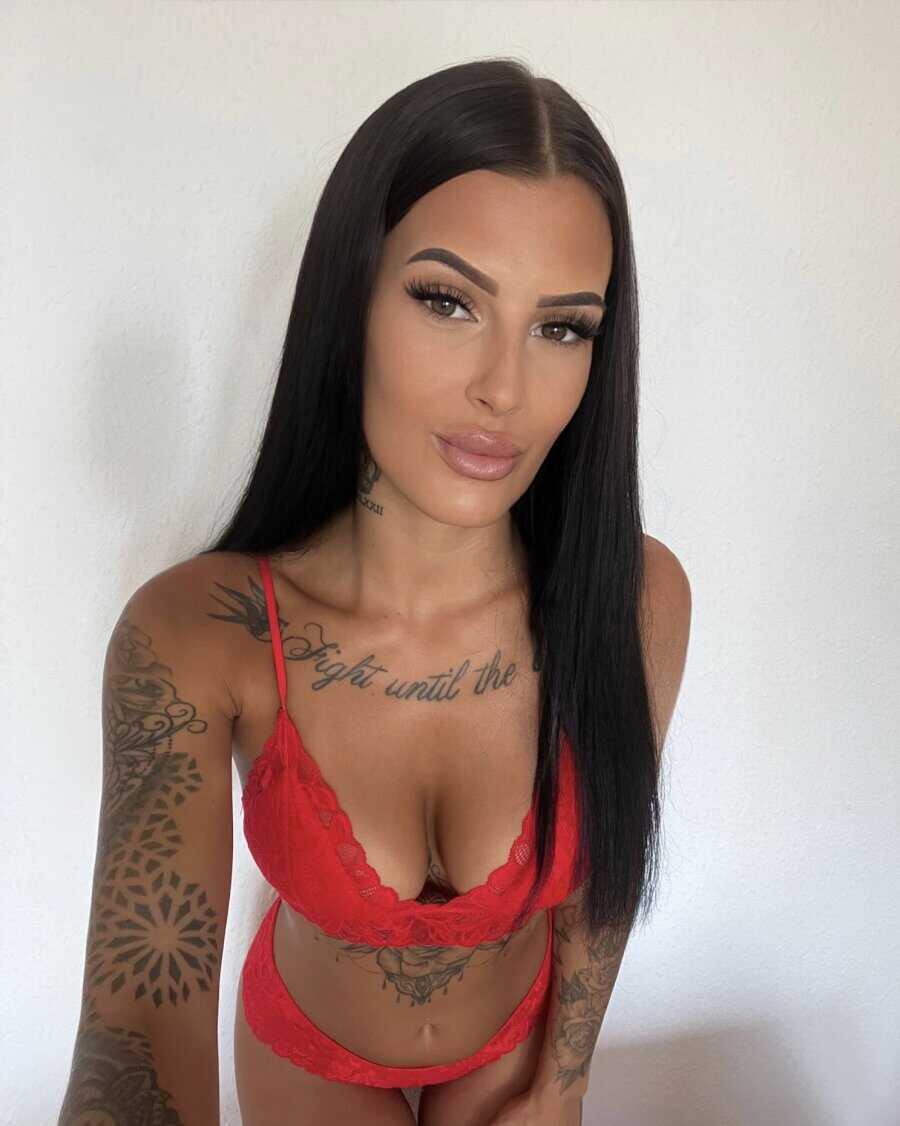 Busty Tattooed Goddess Gets Naughty in Red Lace Lingerie - 