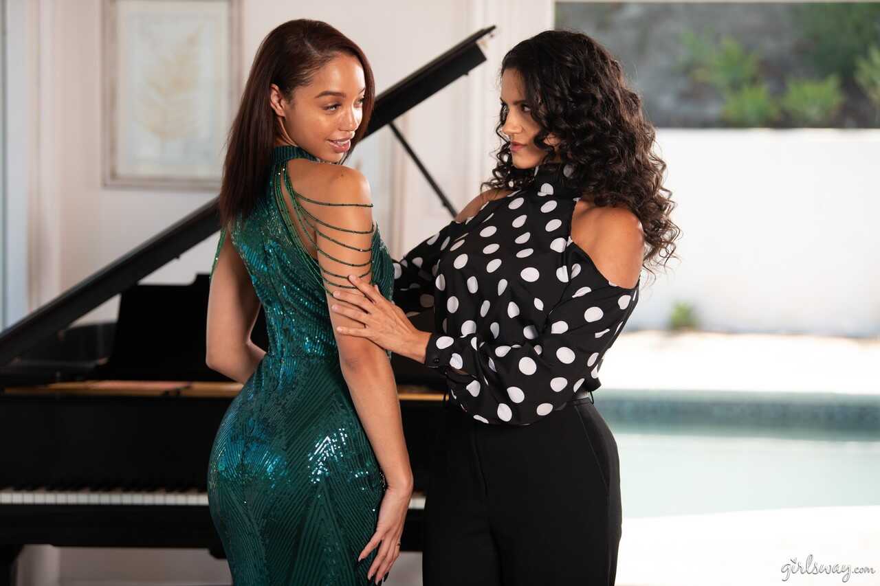 Lesbians Alexis Tae and Penny Barber engage in passionate scissoring as they tongue each other's pussies in a hot 69 ...