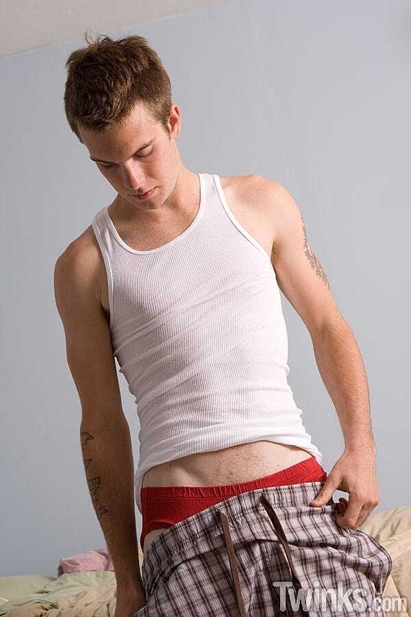 Kent's Hard Dick Delight: A Good-Looking Twink Plays with His Fully Erect Cock Up Close in His Sexy Gay Panties - 