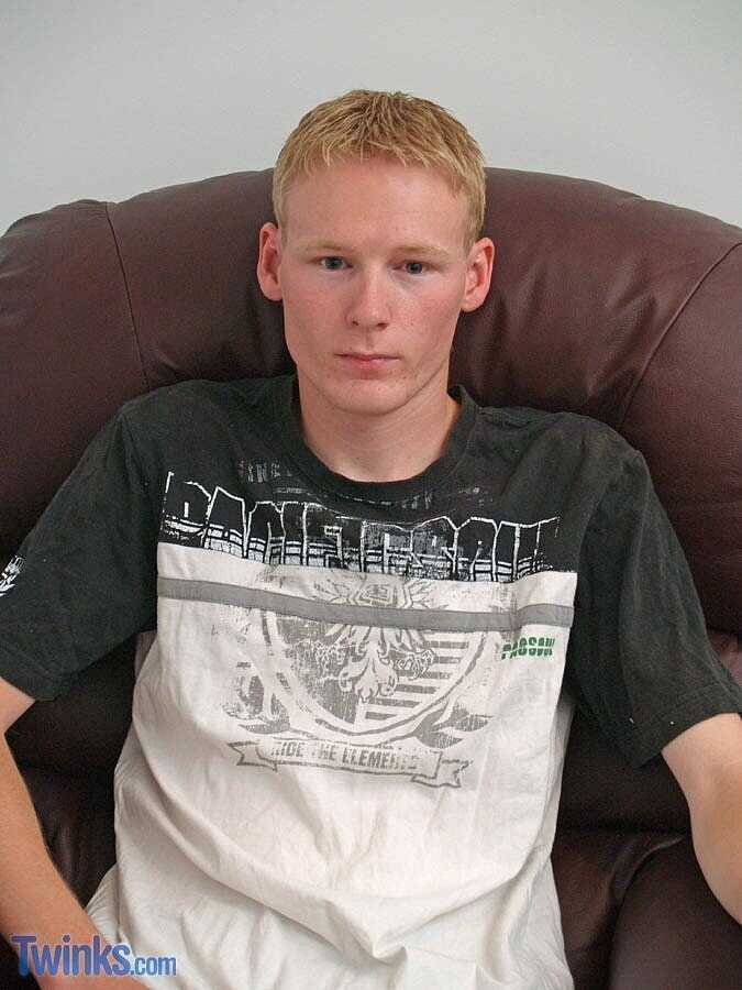 Barely legal blonde twink jacks off in front of the mirror with his big ass while singing gay cock tunes. - 