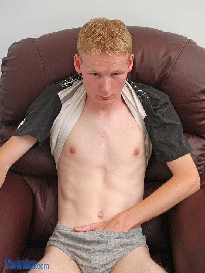 Barely legal blonde twink jacks off in front of the mirror with his big ass while singing gay cock tunes. - 