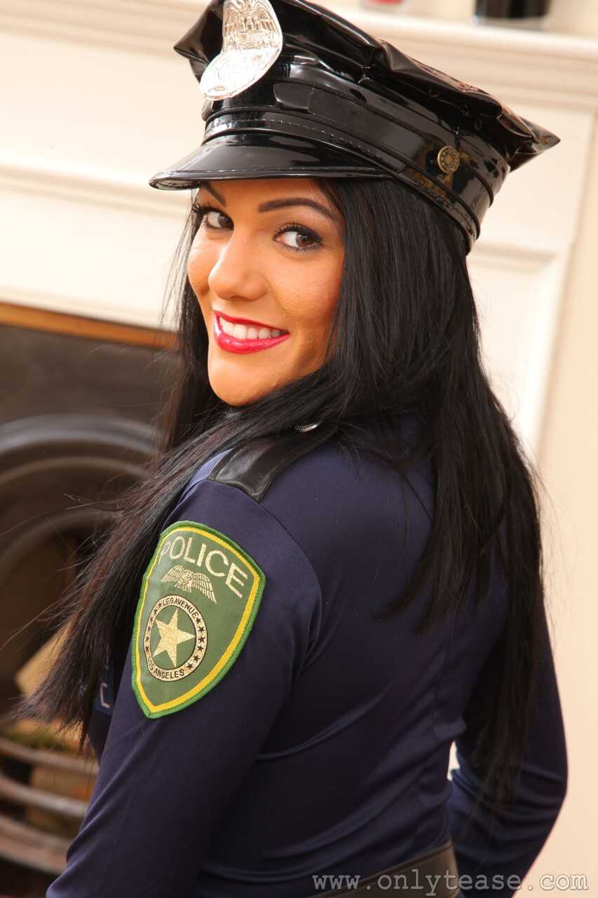 Sexy Cop Charelle Marie Strips Her Uniform To Show Off Her Nylon-Clad Thighs And High Heels! - Charelle Marie