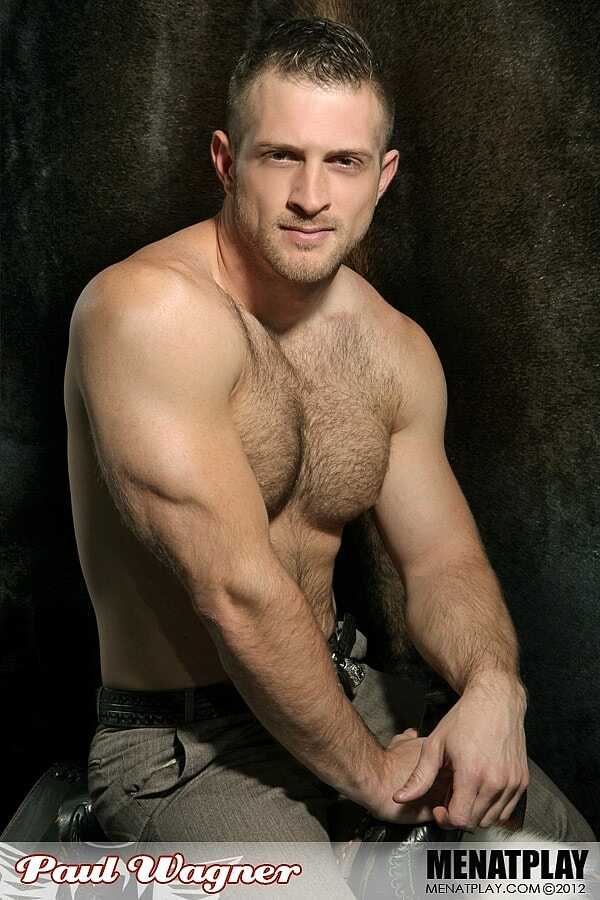 Bare-chested beefcake Paul Wagner flexes for the camera as he strokes his stiff pole - 