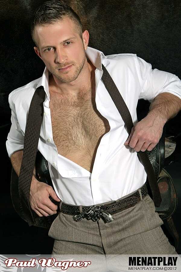 Bare-chested beefcake Paul Wagner flexes for the camera as he strokes his stiff pole - 