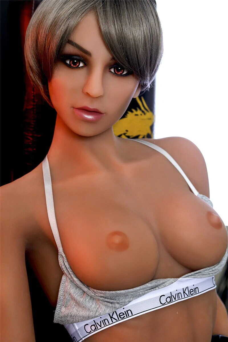 Fantasy fulfilled with the sexy sex doll, showing off her perfect breasts and curvaceous behind. - 