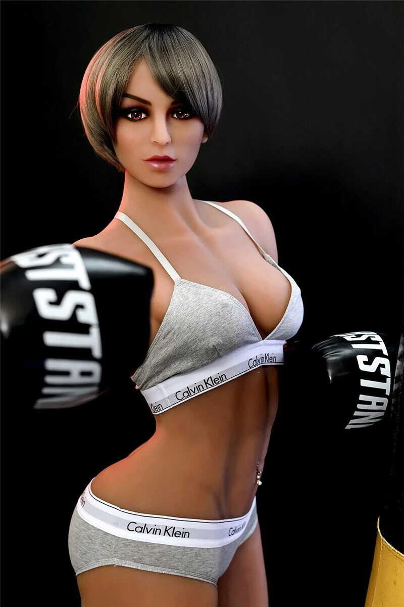 Fantasy fulfilled with the sexy sex doll, showing off her perfect breasts and curvaceous behind. - 