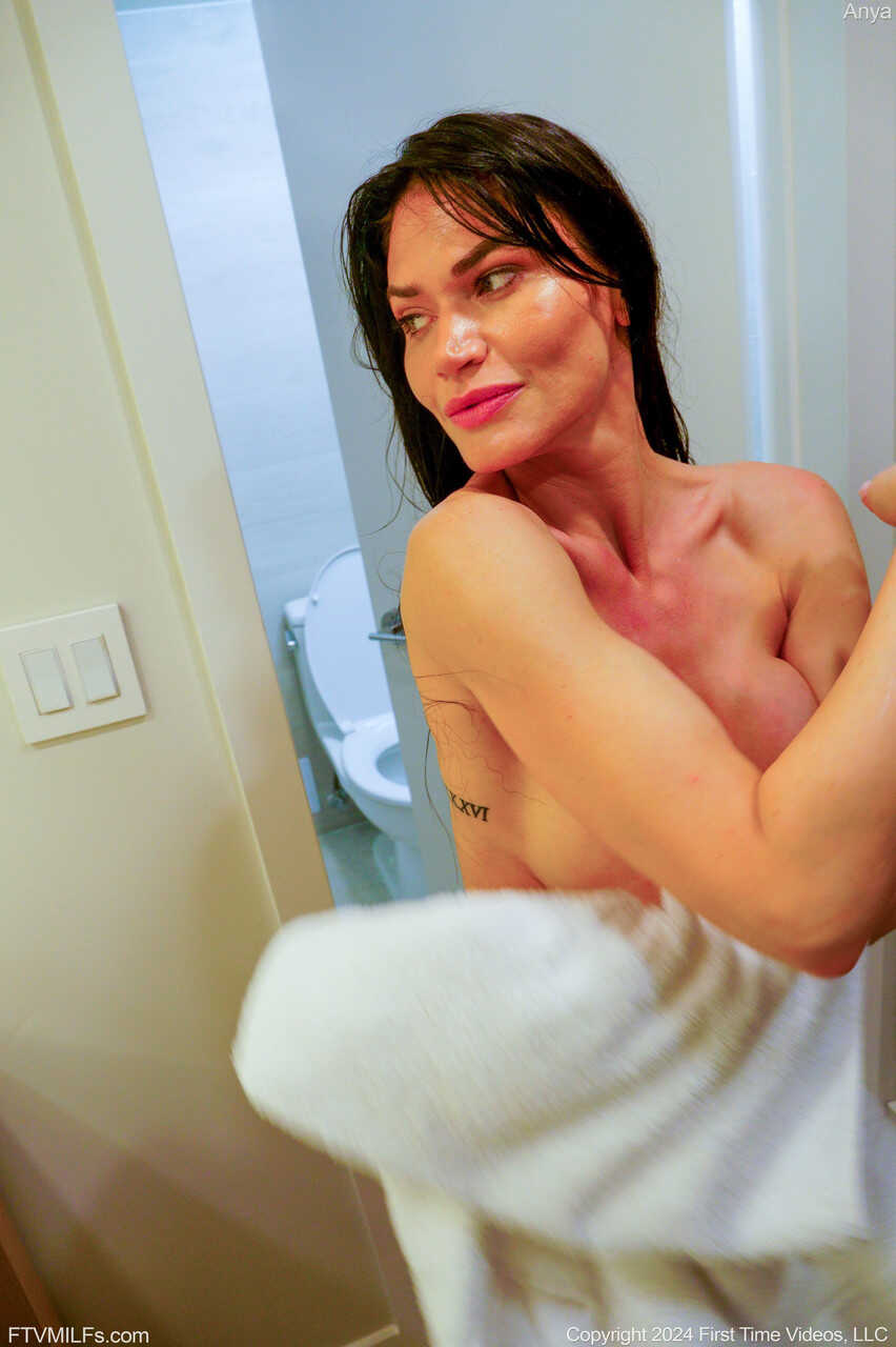 Busty Amateur MILF Anya Shows Off Her Smooth Legs and Pussy in the Shower - Anya
