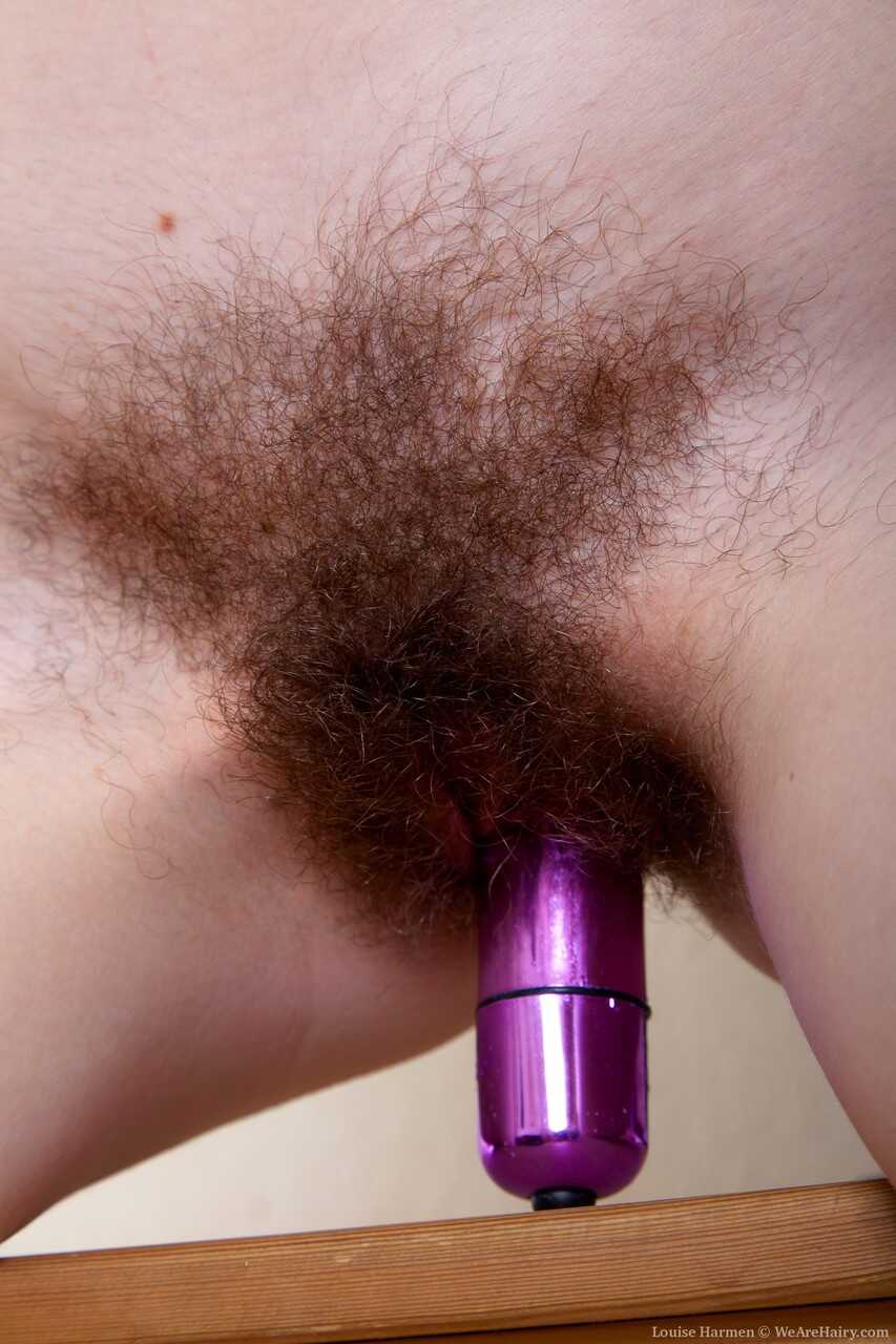 Brunette teen with small titties Louise Harmen toys her bushy beaver in a solo - Louise Harmen