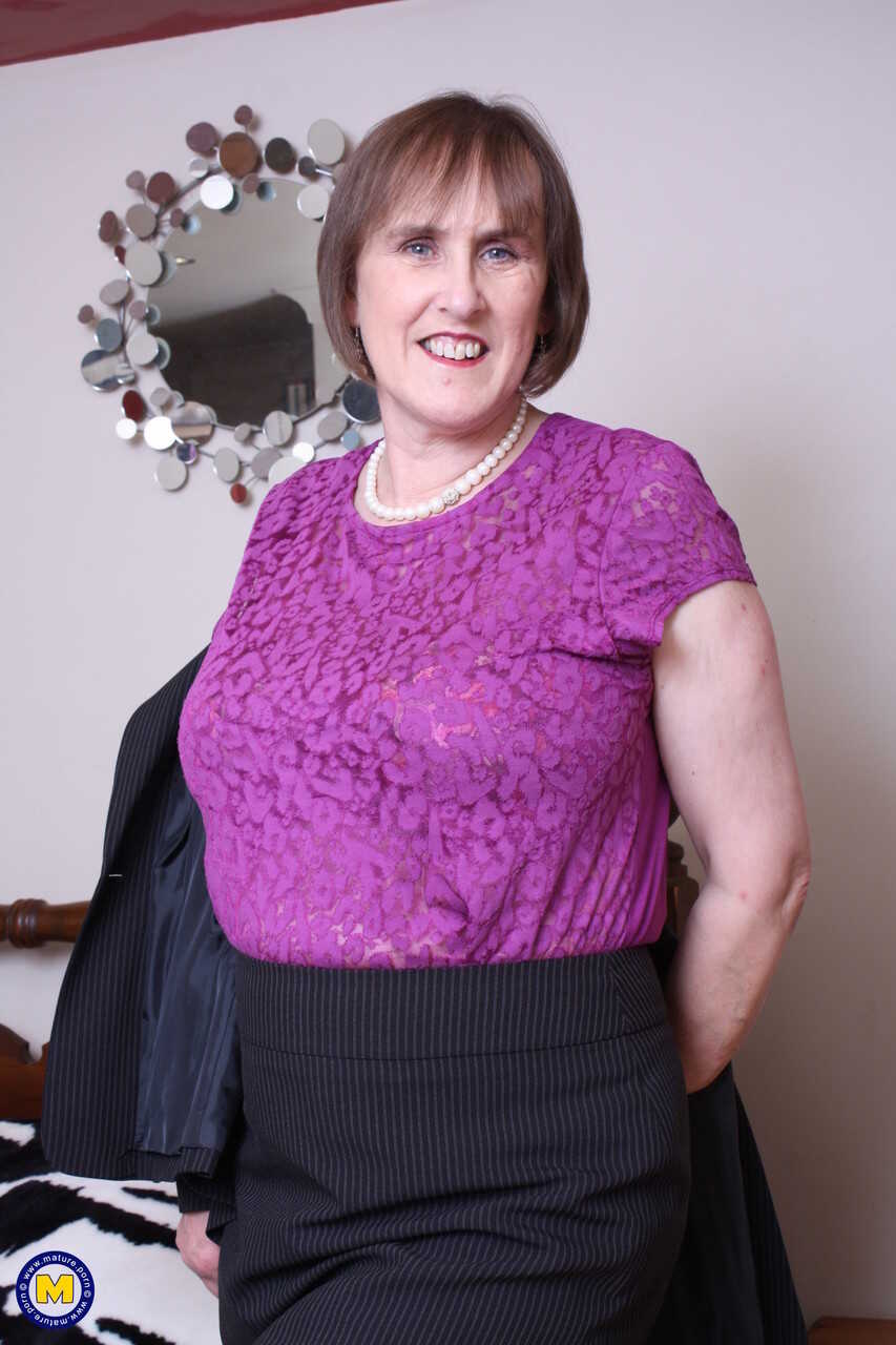 Big-breasted granny Allison strips down to her stockings & toys her hairy cunt for your pleasure - Allison