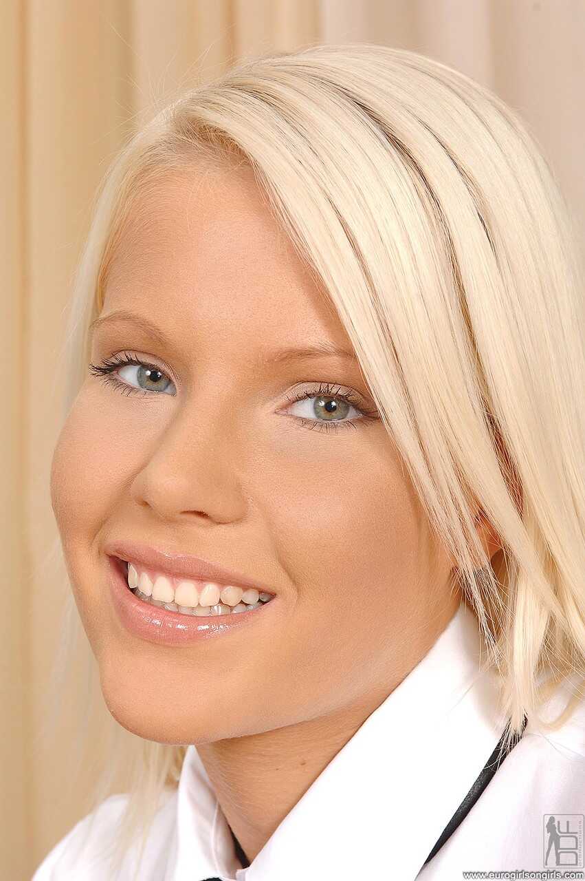 Blonde teens Gitta Blond & Pink Pussy rub each other's muffs with their feet - Gitta Blond