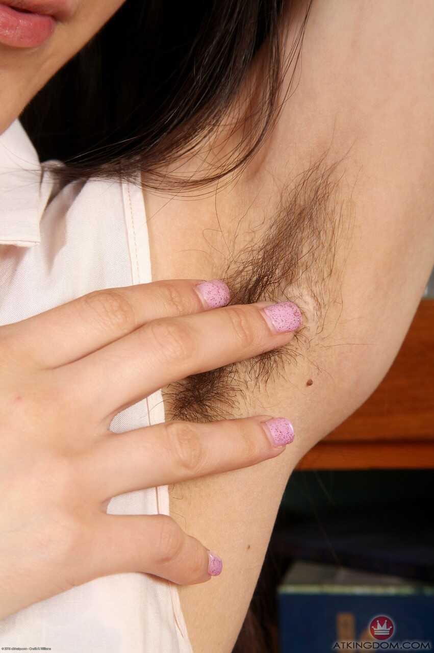 Brunette amateur Annie's hairy bush reveals her twat and armpits in a solo - Annie