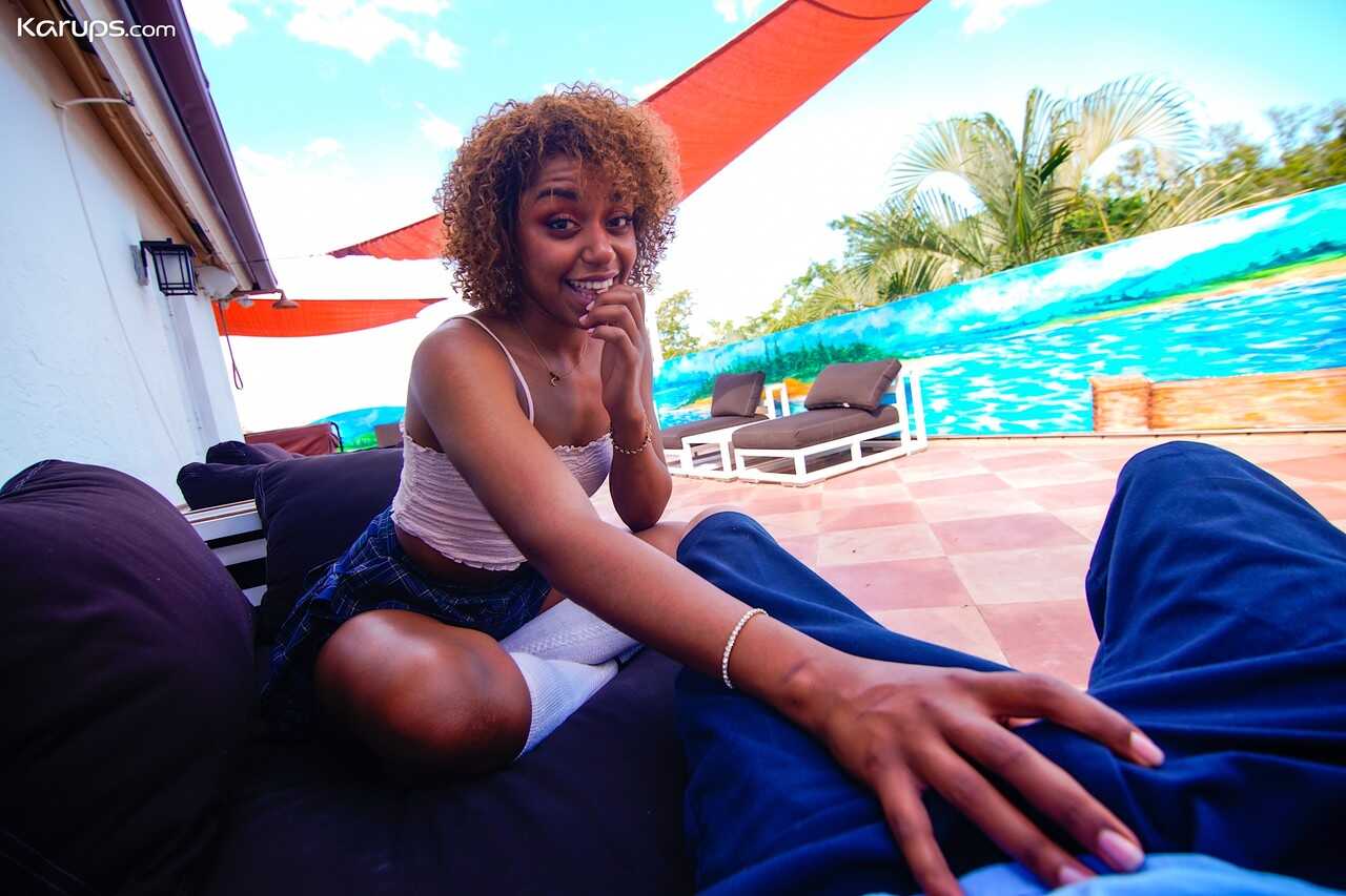 Curly-haired ebony babe Milu Blaze takes on a white dong in POV for an intense facial cumshot - Milu Blaze