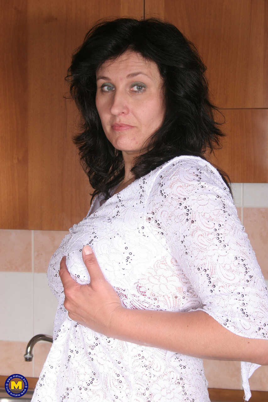 Curvy amateur mom Marietta Sirleaf's raunchy solo show featuring her big tits and ass before toying her cunt - Mariet...