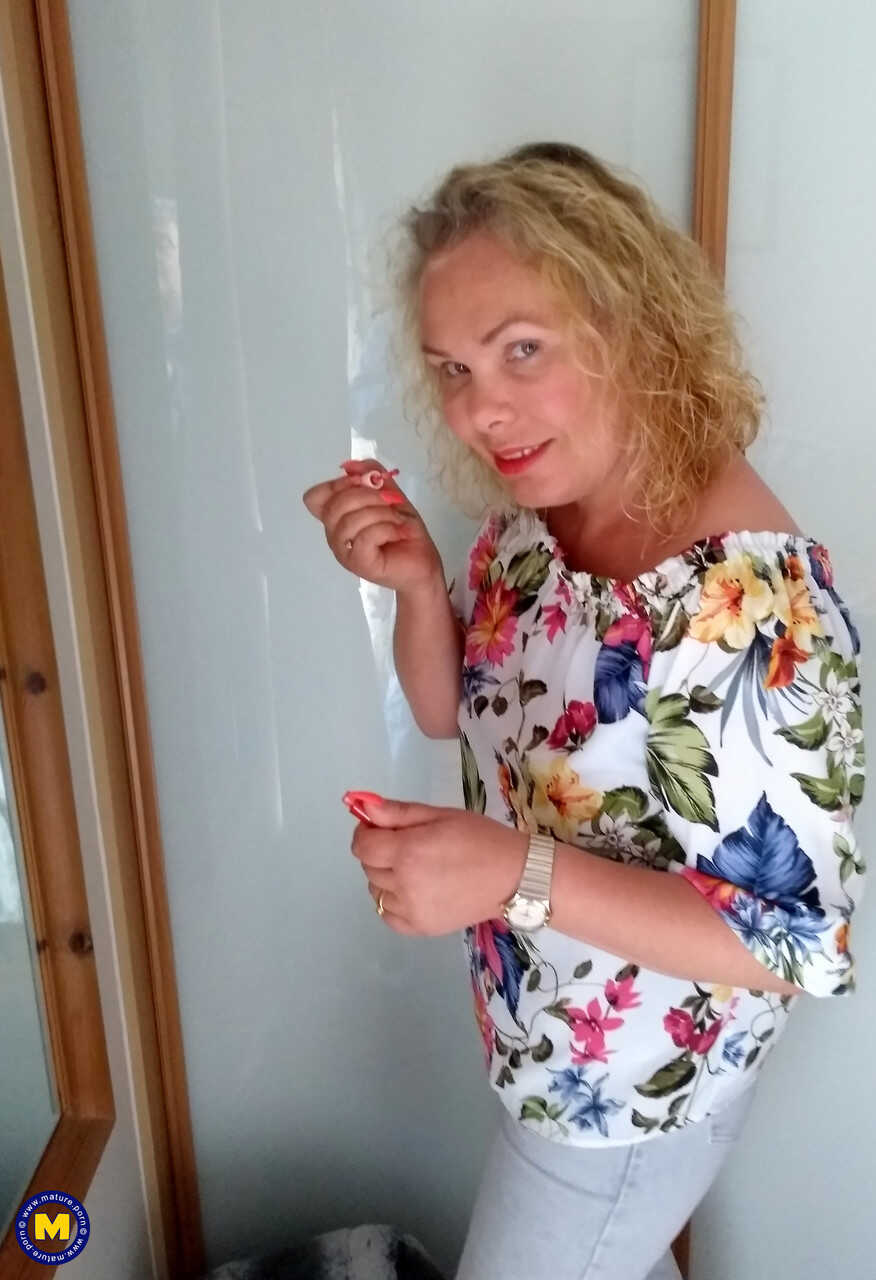 Curly haired Francesca Kitten flaunts her hot legs in stockings for a lucky British amateur cougar - Francesca Kitten
