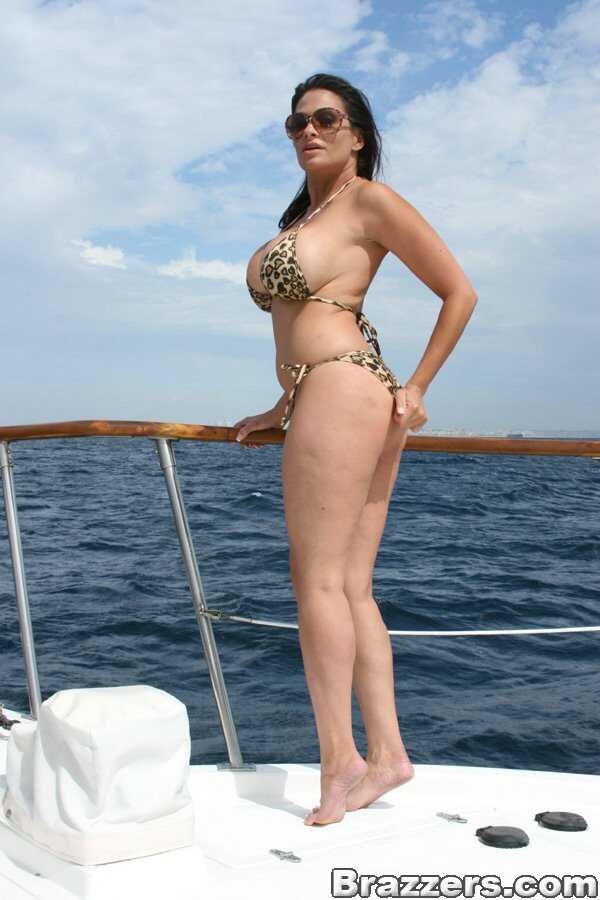 Curvy brunette MILF Ava Lauren strips down to her sexy leopard bikini on the yacht and shows off her mature assets for all the sailors to see!