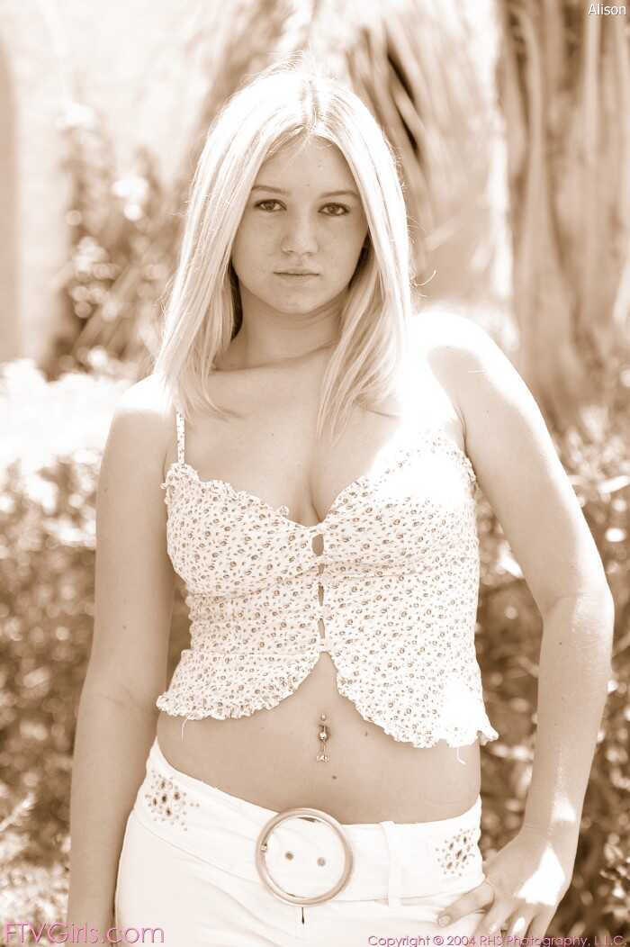 Sexy Alison Angel strips down to her white corset and pants, flaunting her lovely tits and slim body for the camera - Alis...