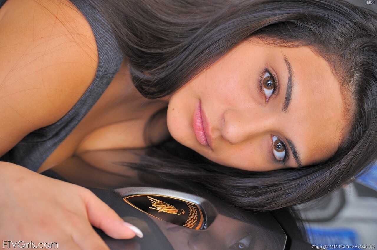 Brunette beauty Rikki exposes her hot boobs and presses them on a car hood - Rikki Nyx