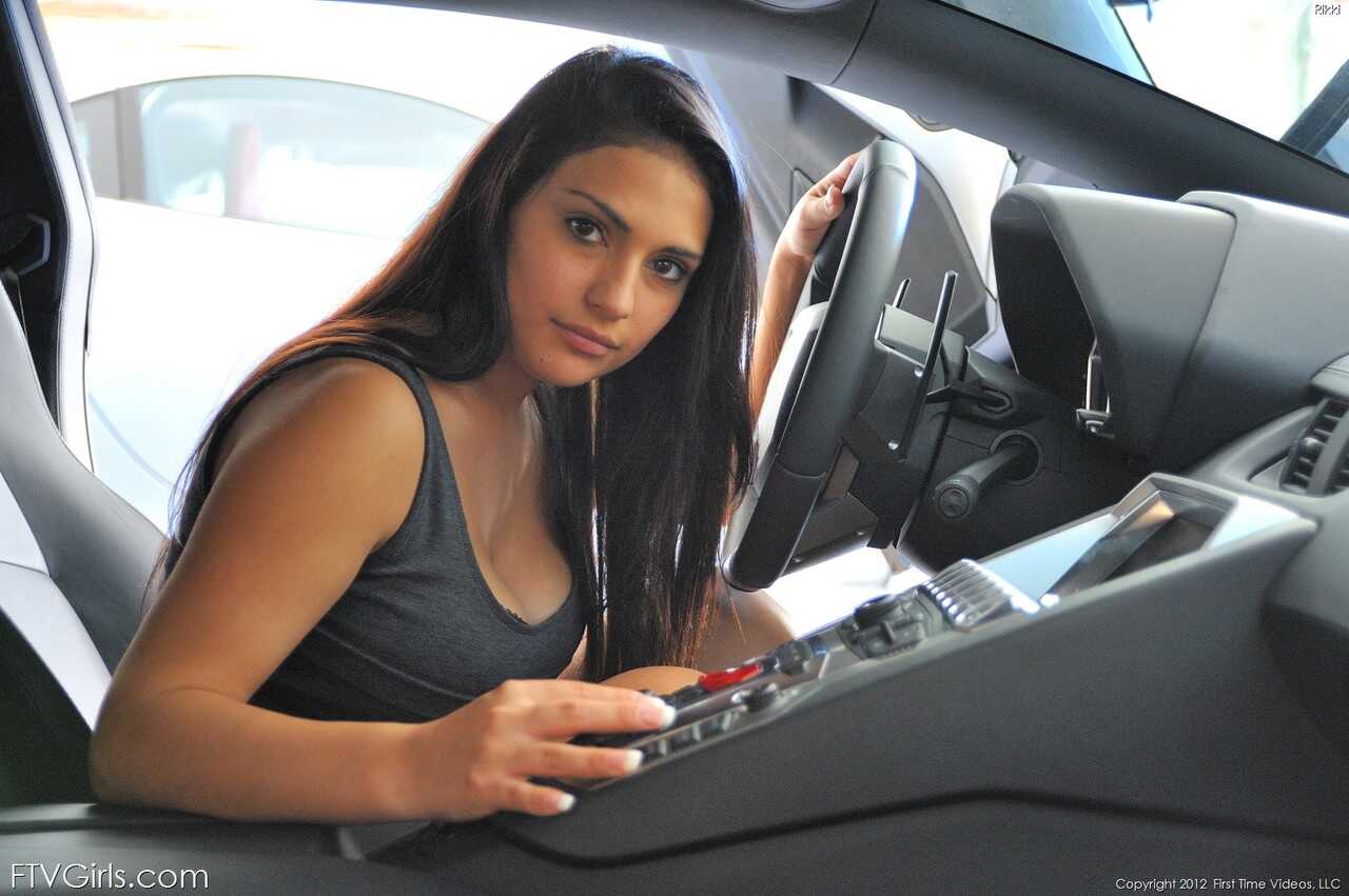 Brunette beauty Rikki exposes her hot boobs and presses them on a car hood - Rikki Nyx