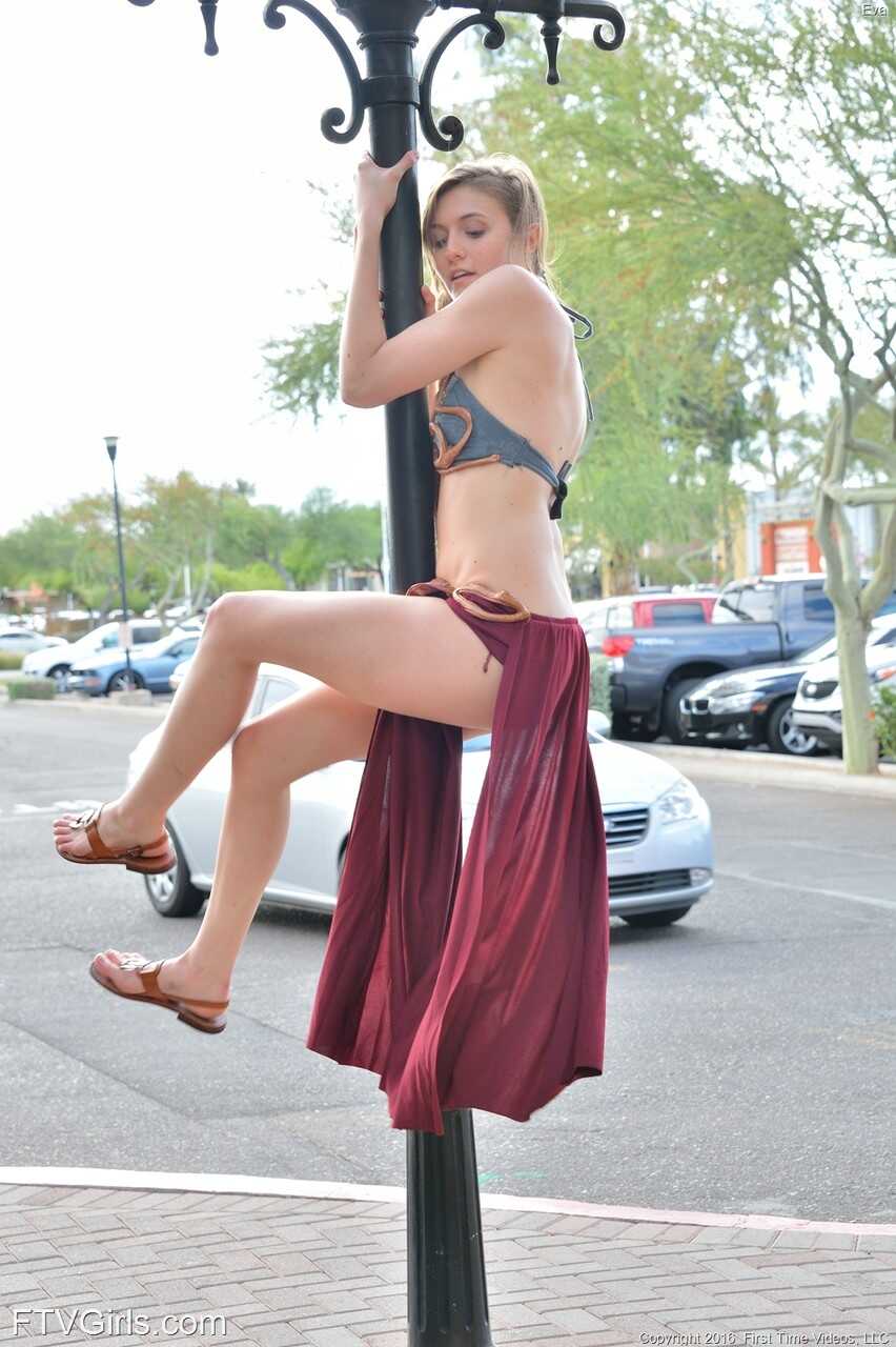 Adorable teen in a princess costume Eva toys her cunt in public - Eva