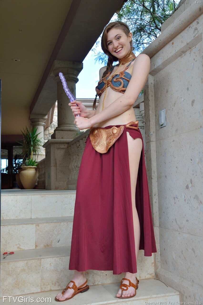 Adorable teen in a princess costume Eva toys her cunt in public - Eva
