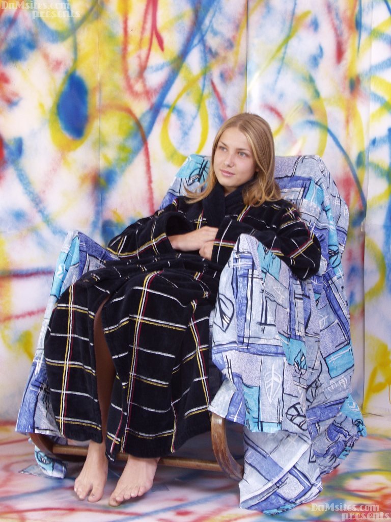 Young Blonde Removes Housecoat And Thong For First Nude Poses